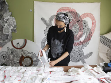 Olivia Guterson at work on her Plastover Sculpture